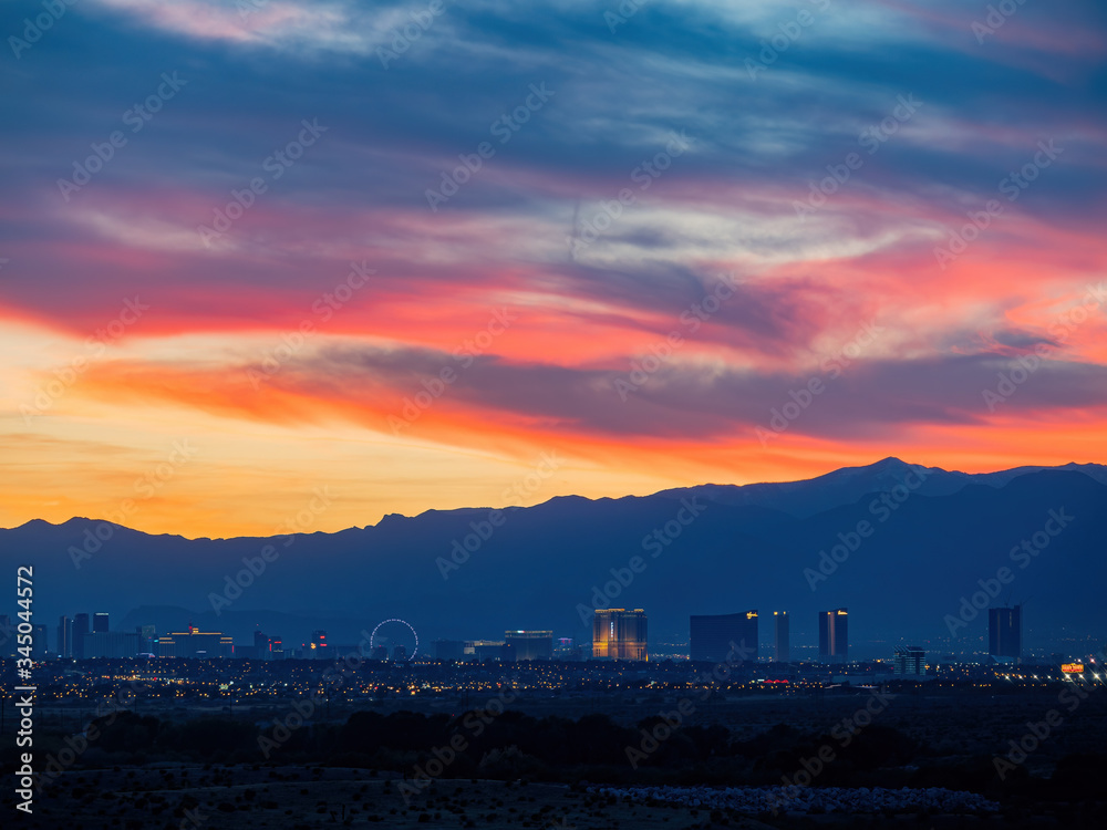 Sunset view of the beautiful strip skyline with red clouds
