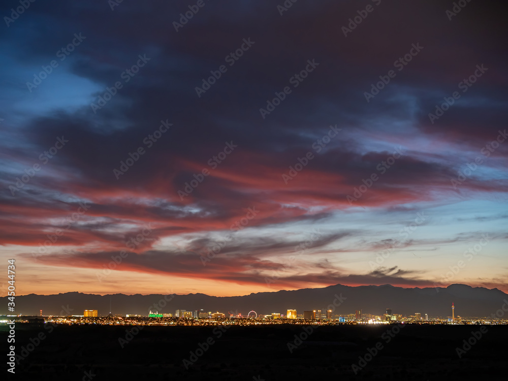 Sunset view of the beautiful strip skyline with red clouds