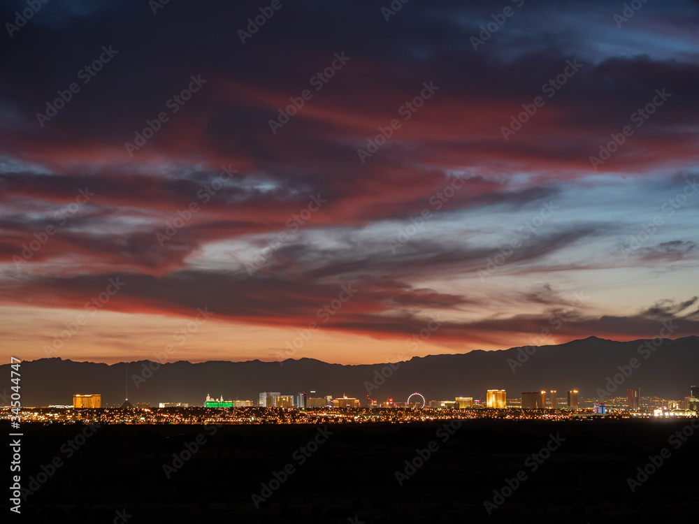 Sunset view of the beautiful strip skyline with red clouds