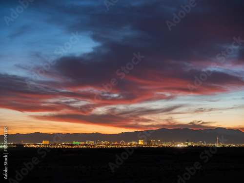 Sunset view of the beautiful strip skyline with red clouds