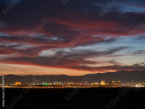 Sunset view of the beautiful strip skyline with red clouds