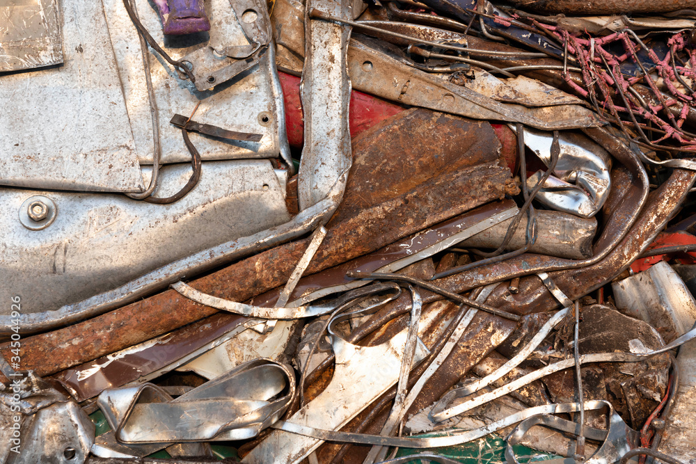 Piles of scrap metal bundled in bales for recycling,close up Piles of scrap metal bundled in bales for recycling,close up