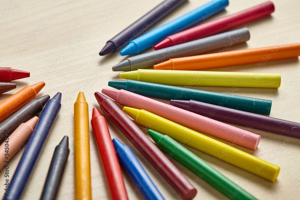 Colorful crayon on wooden table Colorful crayon on wooden table