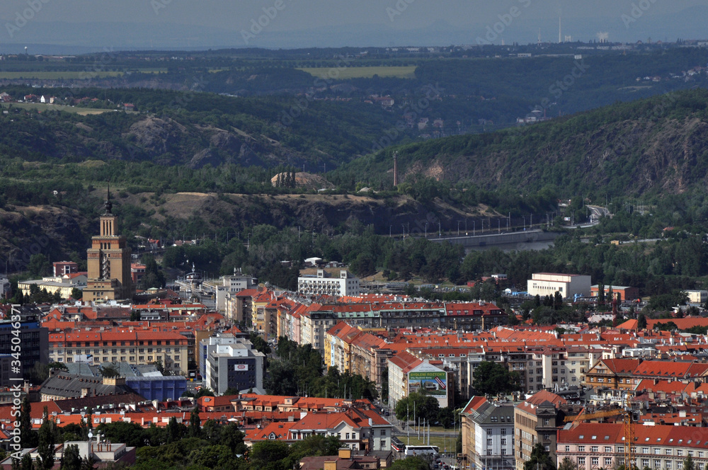 Fototapeta premium The city of Prague is surrounded by picturesque mountains from all sides