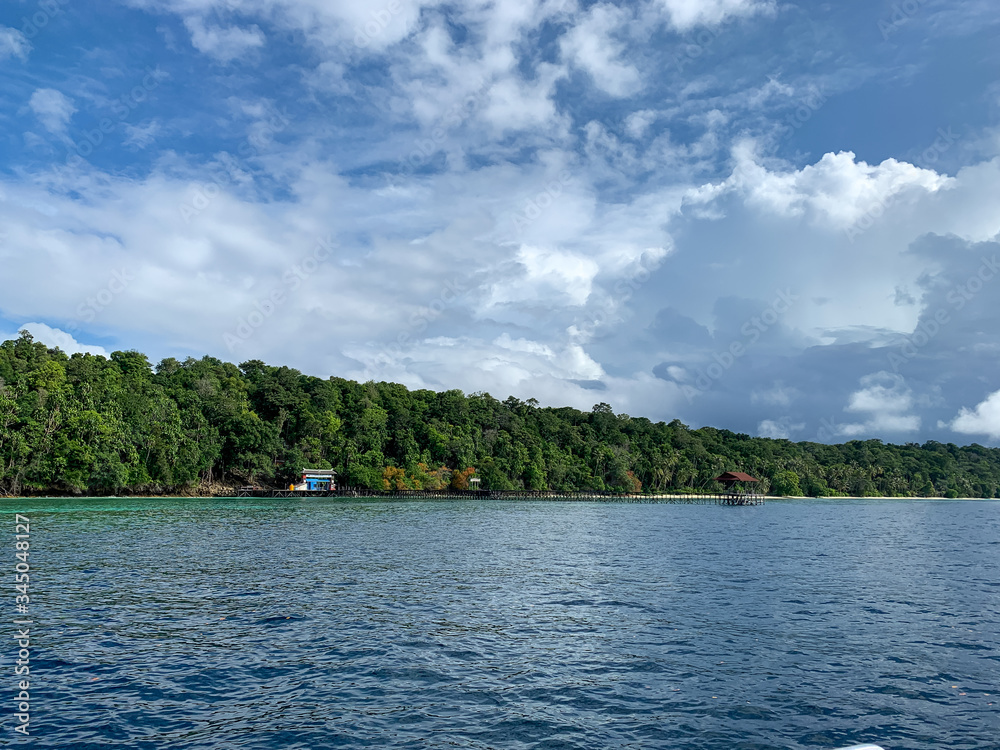 Kakaban Island, North Kalimantan, Indonesia shoreline over beautiful turquoise water.  Leisure and Travel.