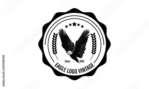 vintage-style emblem logo with an eagle theme photo