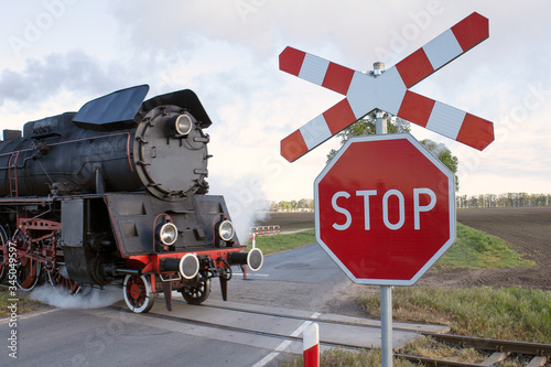 Obraz na plátně Stop - railway crossing / level crossing road sign