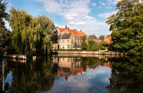 Ancient castles on the lake of love in Bruges