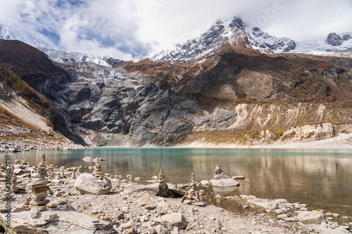 Beautiful Birendra lake in Samagaun village in Manaslu circuit trek, Himalaya mountains range in Nepal © skazzjy
