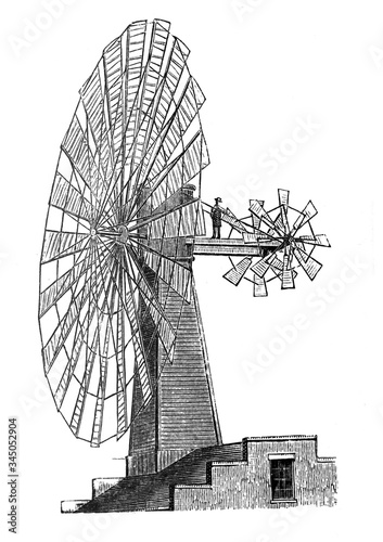 Antique farming windmill for watering the land with / Antique illustration from Brockhaus Konversations - Lexikon 1908 photo