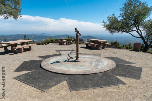 Telescope on the summit of the Double Peak Park in San Marcos. 200 acre park featuring a play area and hiking trails that lead to a summit.