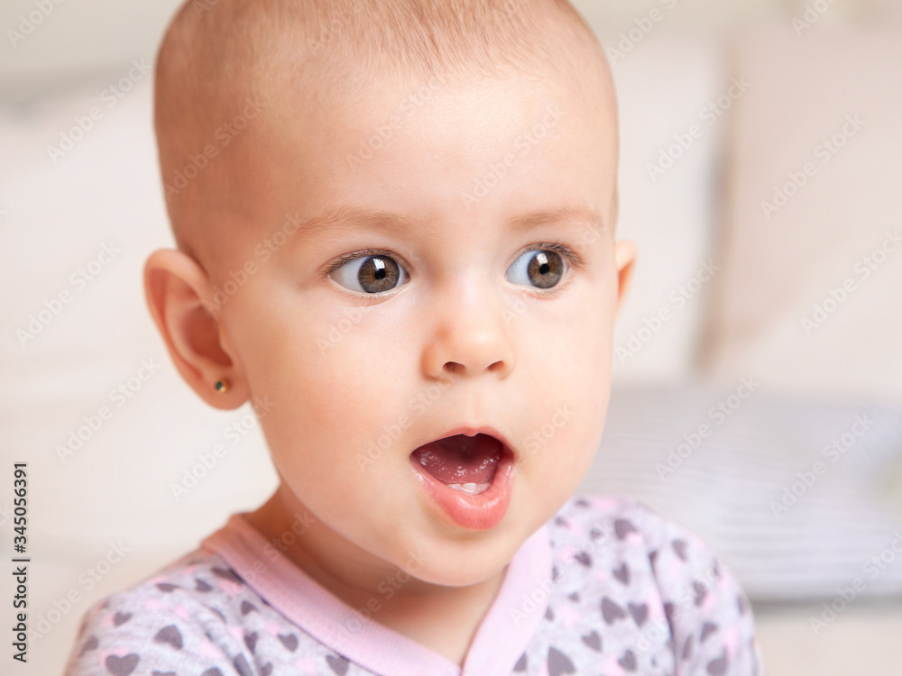 The little girl is very surprised, dumbfounded. She's in shock. Bright children's emotions. Delight in surprise. The little girl is very surprised, dumbfounded. She's in shock. Bright children's emotions. Delight in surprise.