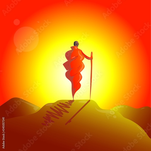Gandhi Jayanti is a national holiday in India celebrated on 2nd October. Monk in a cassock on an orange background