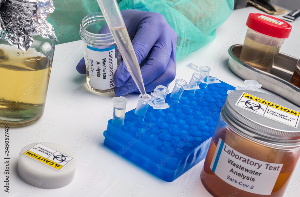 Scientific analysis of wastewater sample in laboratory, investigation