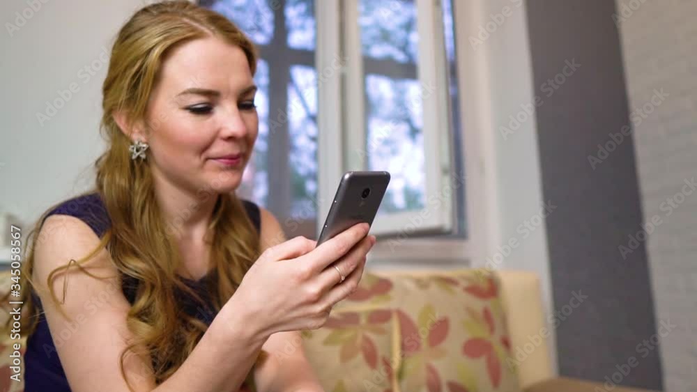 Young woman having a video call through a tablet, talking to mom. friends, facetime, online, internet, long distance communication, chat concepts. Skype talking with grandma Young woman having a video call through a tablet, talking to mom. friends, facetime, online, internet, long distance communication, chat concepts. Skype talking with grandma