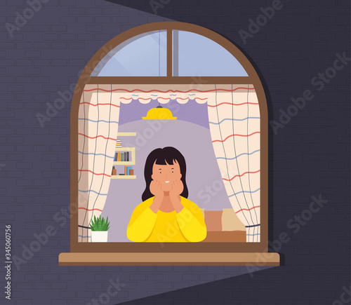 Girl looks out window from apartment. Concept of human life, activity and work from home.