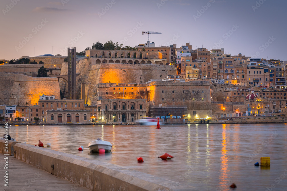 Beautiful architecture of Valletta city at dusk, Malta