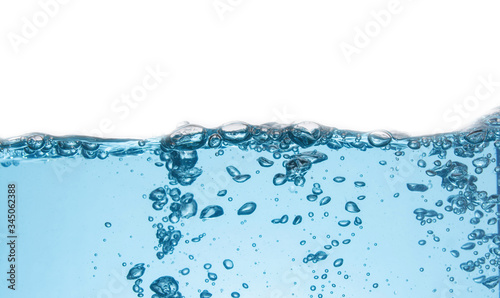 Clean light blue water wave and bubbles air isolated on white background