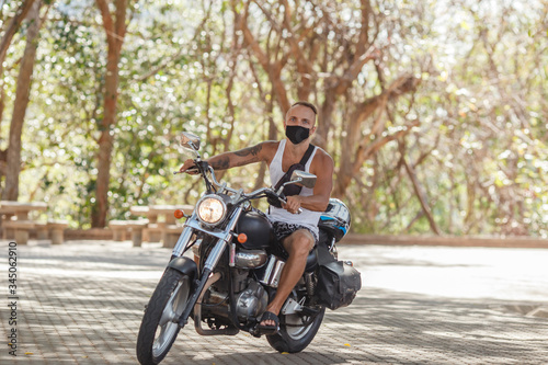 young man riding a motorcycle  Thailand  Phuket bike  motorcycle  bicycle  man  biker  motorbike  ride  motor  young  road  riding  rider  chopper  transportation  speed  boy  cycling  park  person  