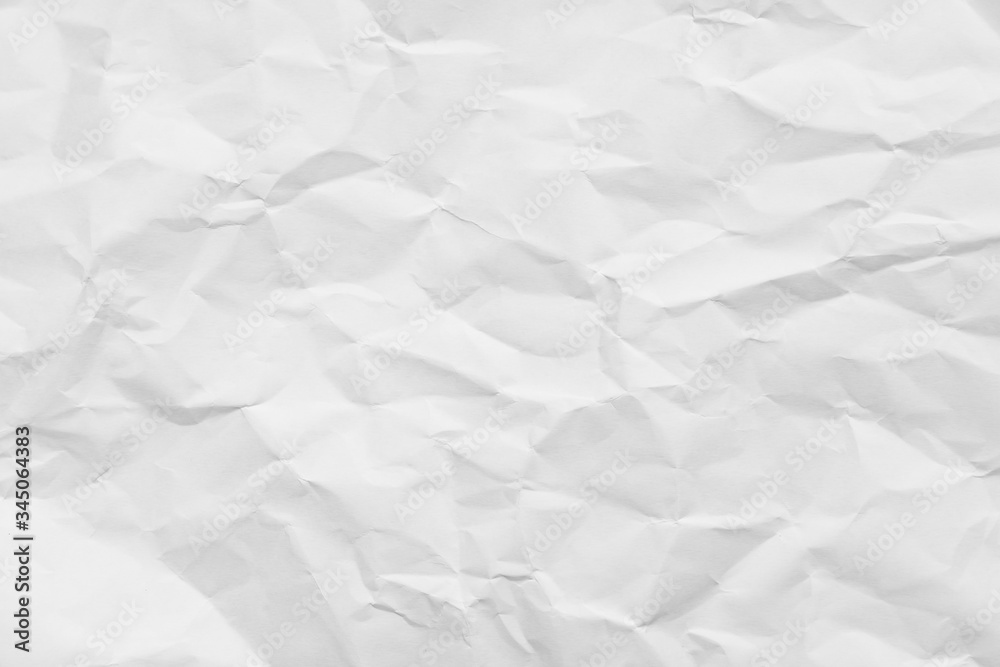 Obraz premium White crumpled paper texture background..