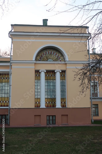 
large dark windows of a light building