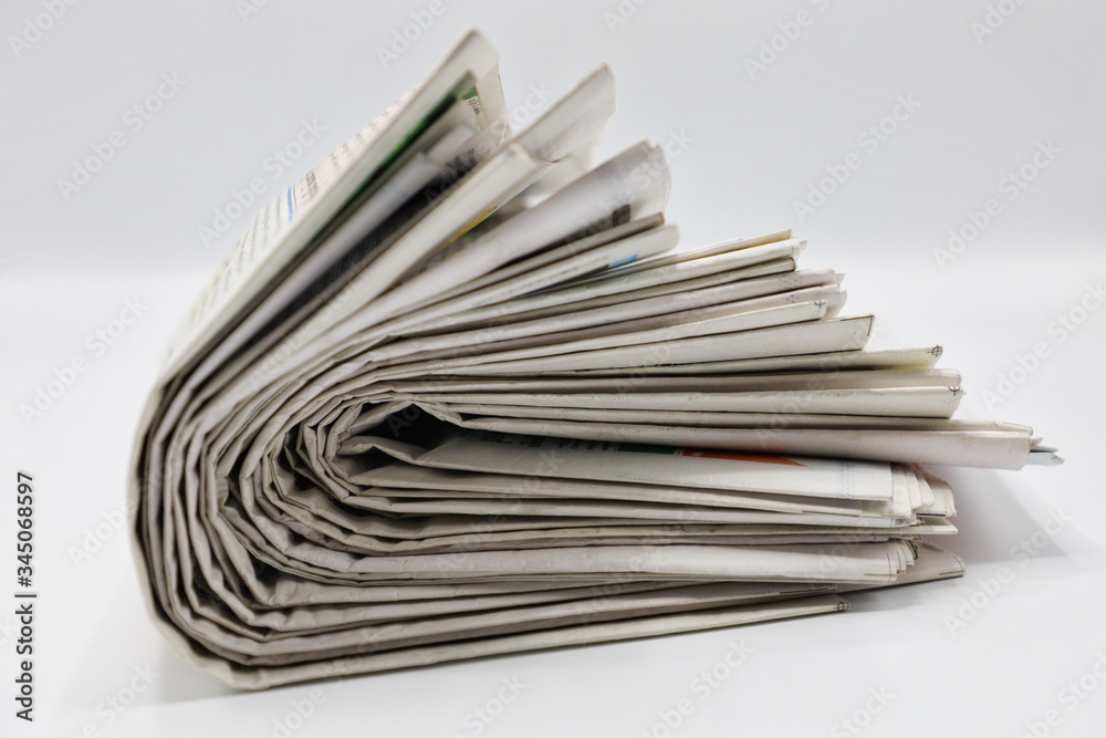 Pile of newspapers stacks on blur background
Pile of newspapers stacks on blur background
