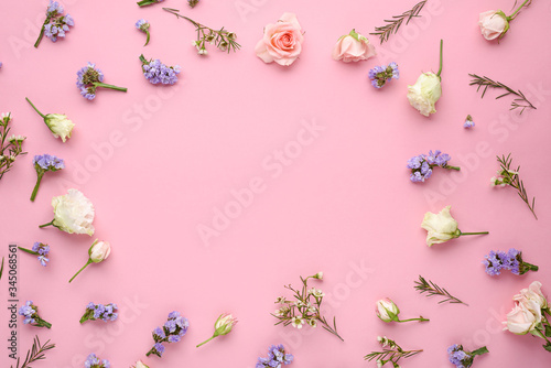 rose buds, eustoma, lemongrass inflorescences on pink background, flower arrangement, floral composition, top view, copy space, place for text