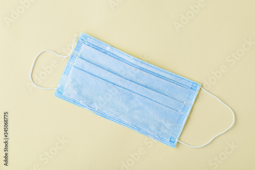 Wallpaper Mural one disposable medical mask on white background Torontodigital.ca