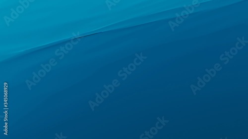 Blue water surface loop motion abstract background with copy space.