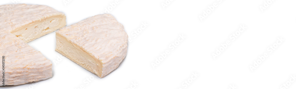 The concept of oriental cuisine. National Italian French Brie type of cheese. Camembert cheese on white background. Long banner format The concept of oriental cuisine. National Italian French Brie type of cheese. Camembert cheese on white background. Long banner format