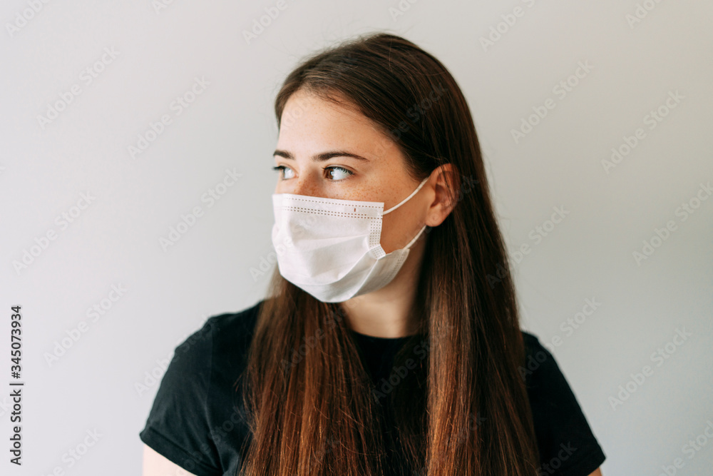 The girl in the coronavirus mask. Quarantine. Safety comes first. The girl in the coronavirus mask. Quarantine. Safety comes first.