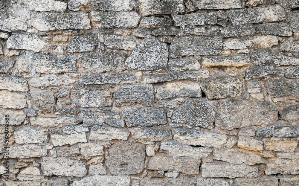Old stone wall. Old stone wall.