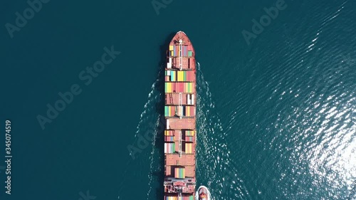 Aerial view of Cargo ship. Large container ship at sea - Aerial top down. 