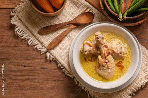 Traditional food served on wooden table photo