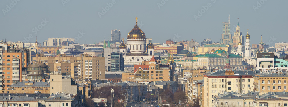 Moscow cityscape in the spring day at time of coronavirus pandemic. Cathedral of Christ the Saviour, Kremlin, Grand Kremlin Palace, Towers, Ivan the Great Bell Tower