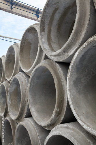 Stack of new concrete pipes.