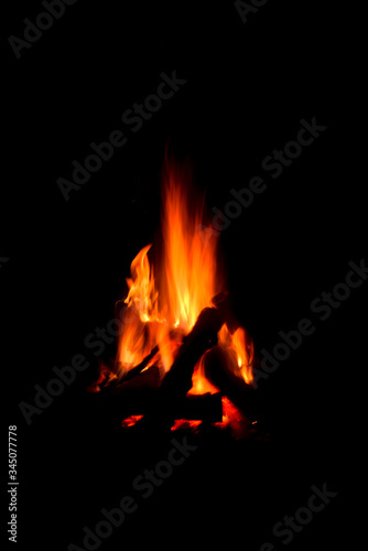 Blazing fire stock photo on firewood