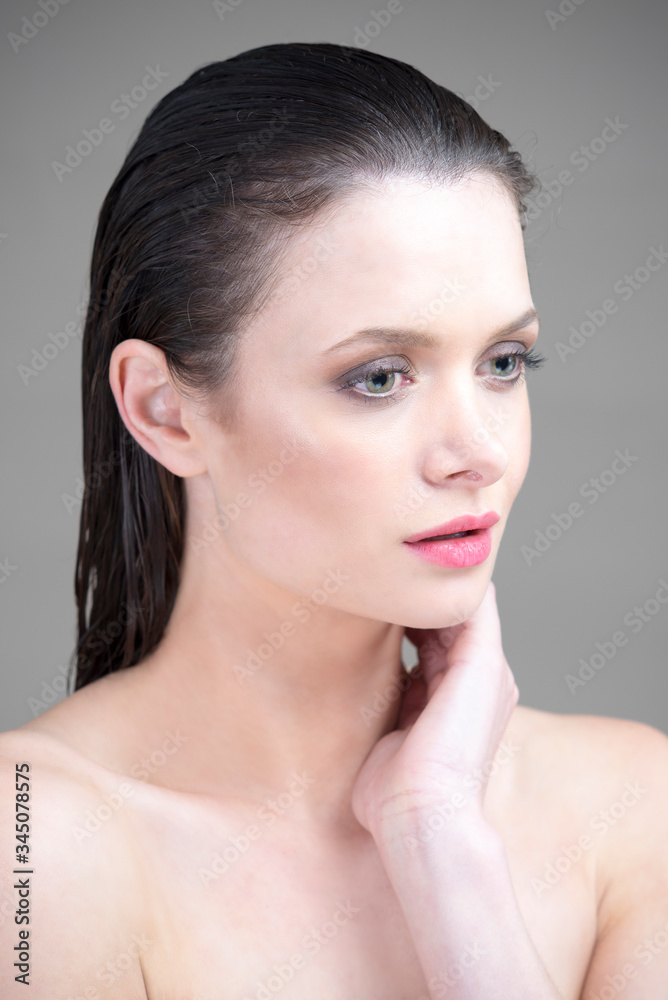 A beautiful model posing with wet hair. perfect photo for make up and hairstyle. Also very sexy look A beautiful model posing with wet hair. perfect photo for make up and hairstyle. Also very sexy look