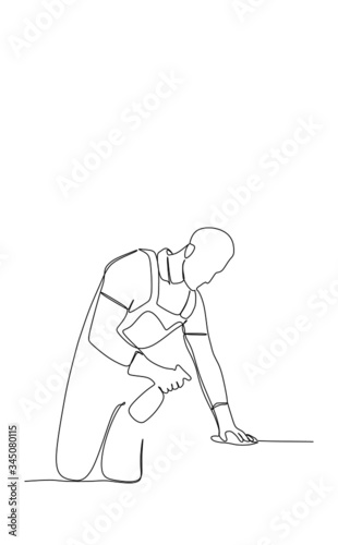 Continuous single line vector illustration of a man cleaning the desk using a sprayer and rag