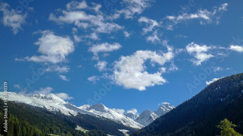 mountain landscape in the alps with clouds