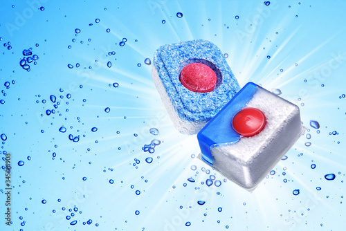Dishwasher detergent tablet under blue water photo
