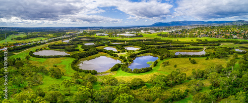 Aerial panorama of Tirhatuan Wetlands in Melbourne, Australia photo