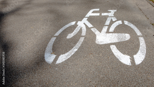 bicycle path symbol painted on the road