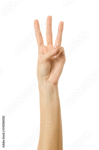 Number three. Woman hand gesturing isolated on white