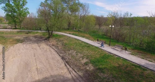 panorama of a boy riding a Bicycle on path in nature,a child riding a bike