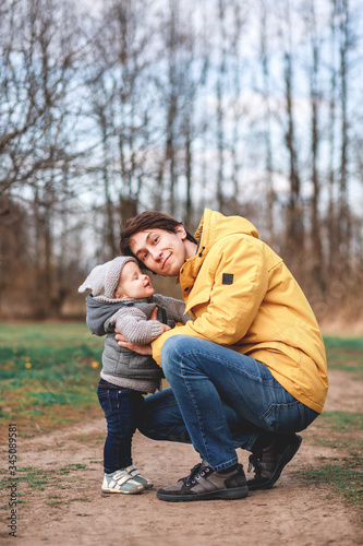 a man takes his child to kindergarten