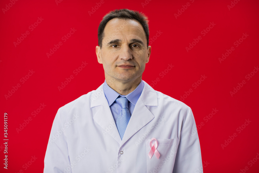 40s medical doctor with red ribbon for AIDS HIV awareness on red background isolated. Symbol of awareness, charity, support in disease, health care, help and hope. Sign of medicine campaign 40s medical doctor with red ribbon for AIDS HIV awareness on red background isolated. Symbol of awareness, charity, support in disease, health care, help and hope. Sign of medicine campaign