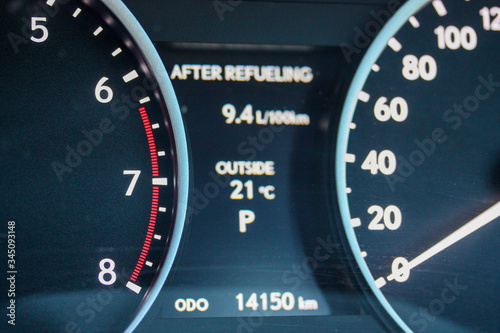 Close up of a car tachometer red zone photo