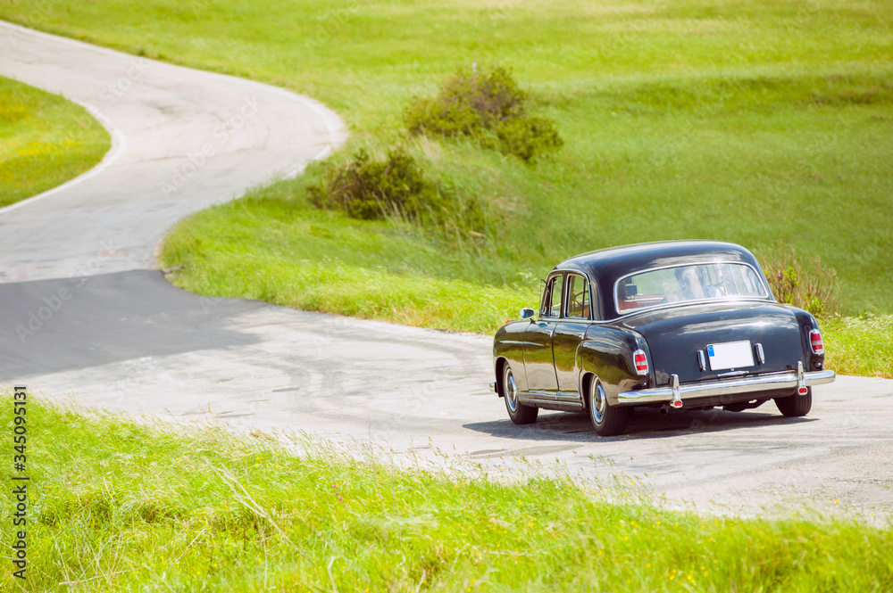 Classic car on winding road