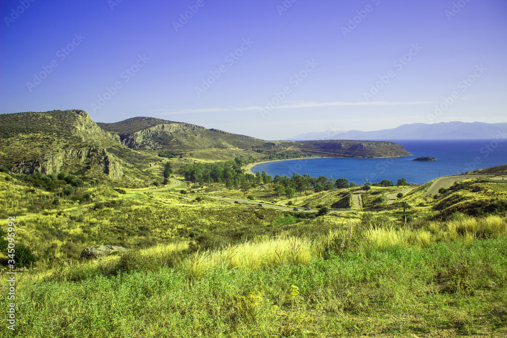 Mediterranean sea bay picturesque landscape nature photography of Italy south shore line with highland rocks and hills in clear weather summer June day